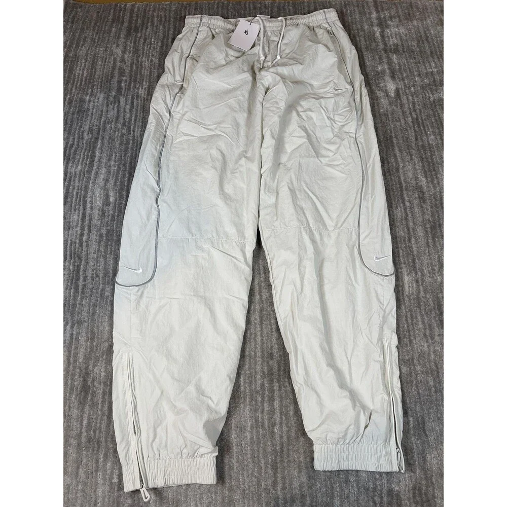 Nike Track Pants Mens Medium White Solo Swoosh Loose Fit Taper Leg Stacked New